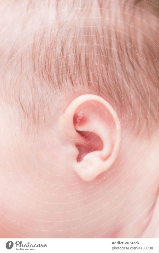 Small soft ear of baby infant body head detail skin child tiny small tender kid pink cute carefree newborn little healthy young beautiful adorable sweet patient
