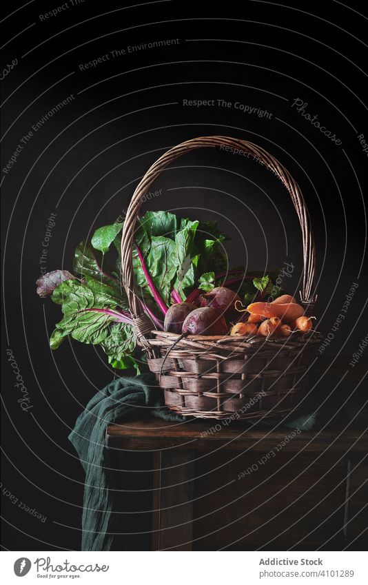 Basket with assorted vegetables on table basket fresh natural organic tasty ripe delicious cool food farm garden rustic wicker season vitamin raw eat meal full