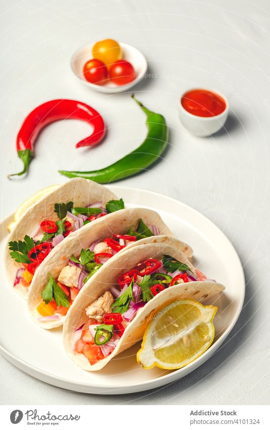 Homemade Mexican Tacos on white background pepper Latin snack fajita mexican parsley cilantro dish delicious healthy food green tasty traditional rustic