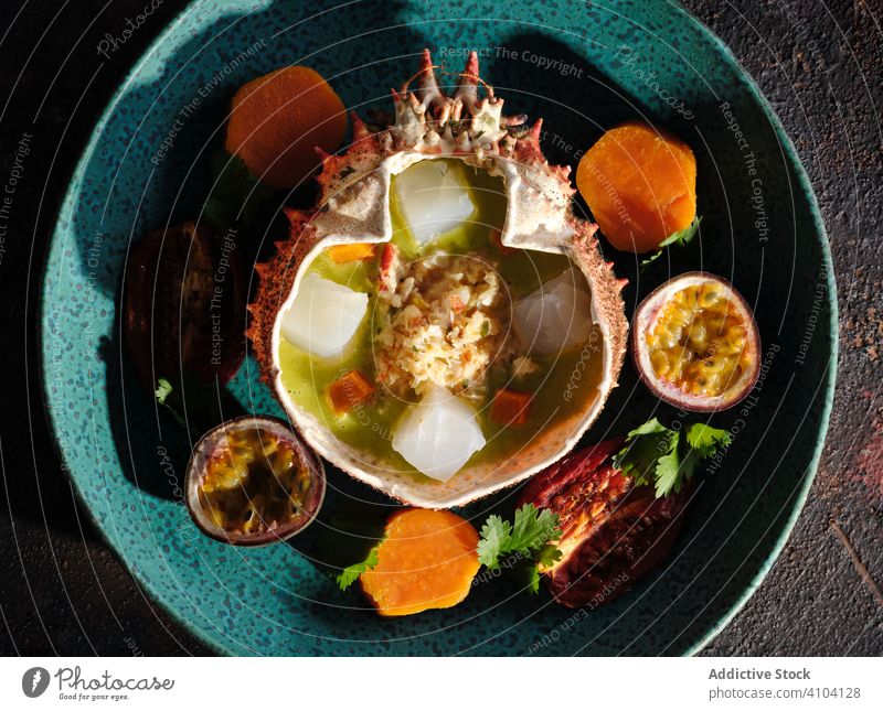 Plate of delicious ceviche in spider crab shell dish seafood restaurant meat fruit exotic plate exquisite marine tropical traditional authentic cooked prepared