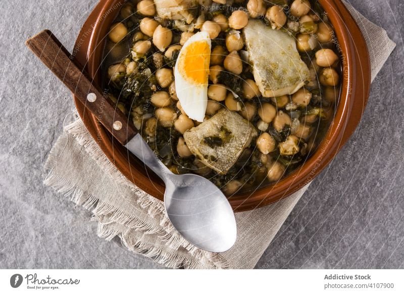 Chickpea stew with spinach and cod fish chickpea cooked vigil potaje delicious food grain healthy holly week homemade recipe slate spanish traditional typical