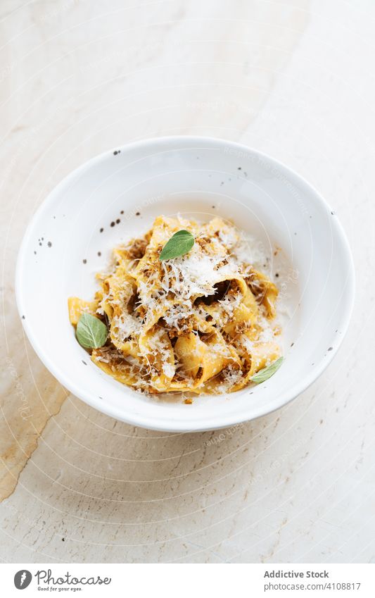 Haute cuisine pasta with cheese in restaurant macaroni spaghetti haute cuisine mint plate classic fresh food portion meal dish delicious tradition italian