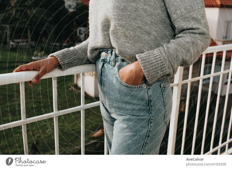 Close up of a woman wearing mom jeans with copy space during a bright day, fashion and styling concept person female elderly retirement senior smile aged happy