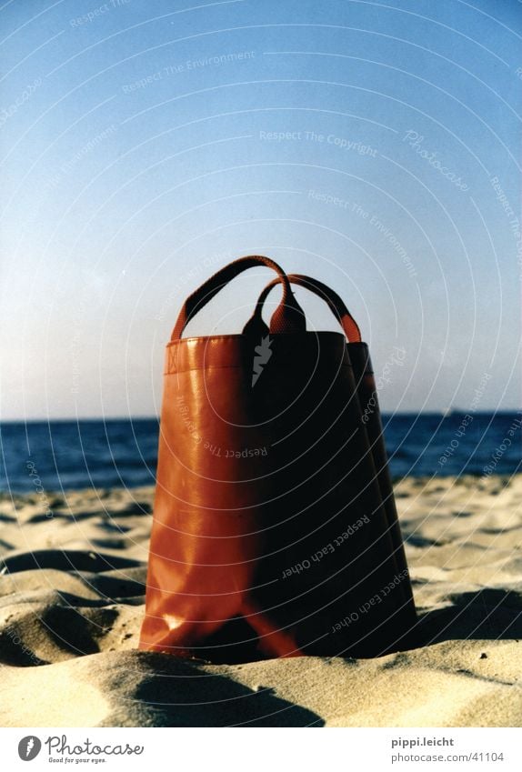 the red bag Bag Beach Red Ocean Photographic technology Sun
