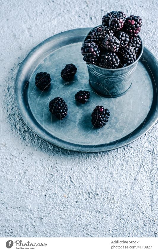 Fresh blackberries in cup and on tray blackberry fresh ripe rustic organic food sweet harvest delicious tasty dessert natural yummy ingredient healthy gourmet