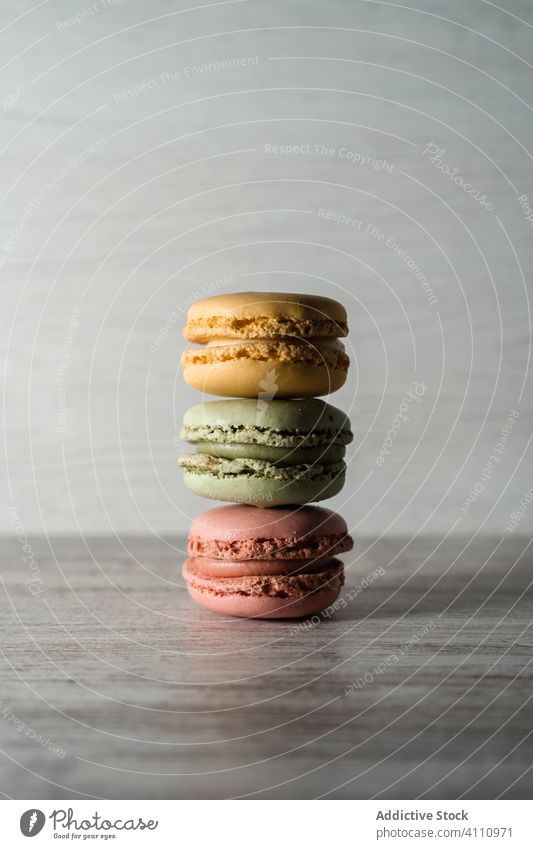Stack of fresh crunchy macaroons macarons stack dessert colorful snack food wall table biscuit sweet gourmet assorted pastry confection traditional delicious