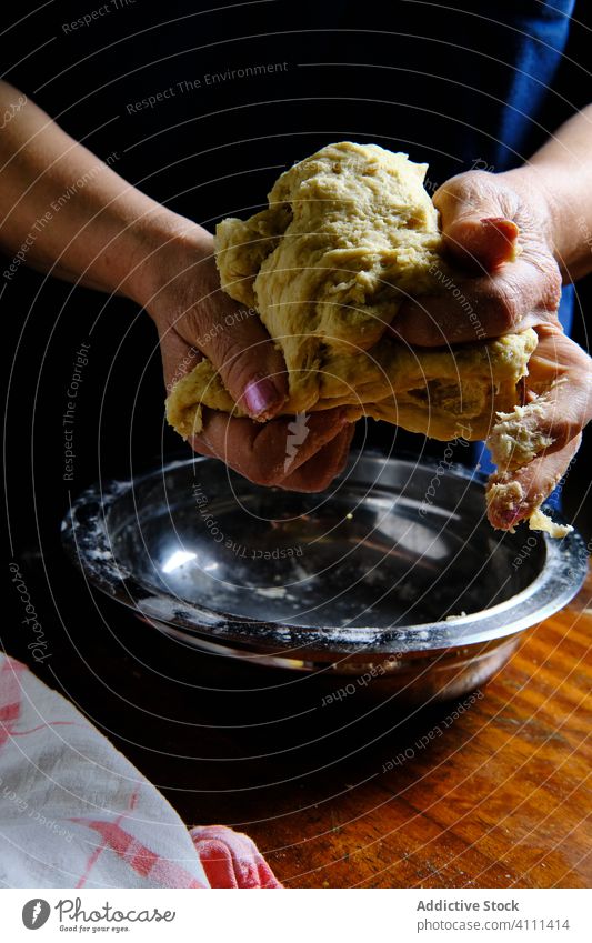 Crop woman kneading soft dough over table pastry kitchen home cook lemon napkin bowl female homemade food prepare doughnut donut ingredient fresh culinary lady