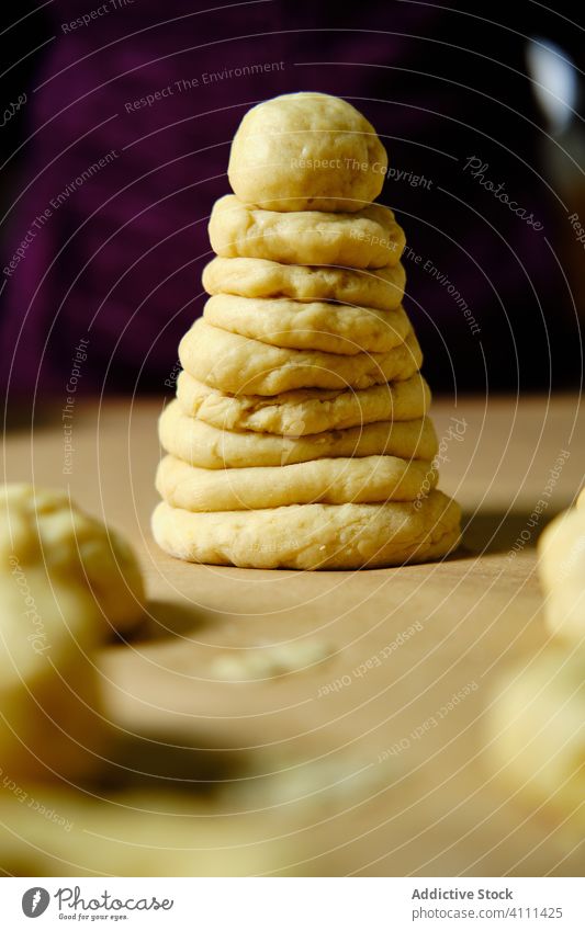 Pile of raw doughnuts and ball donut stack cook pastry composition table home food prepare fresh kitchen bakery cuisine flour tradition recipe homemade