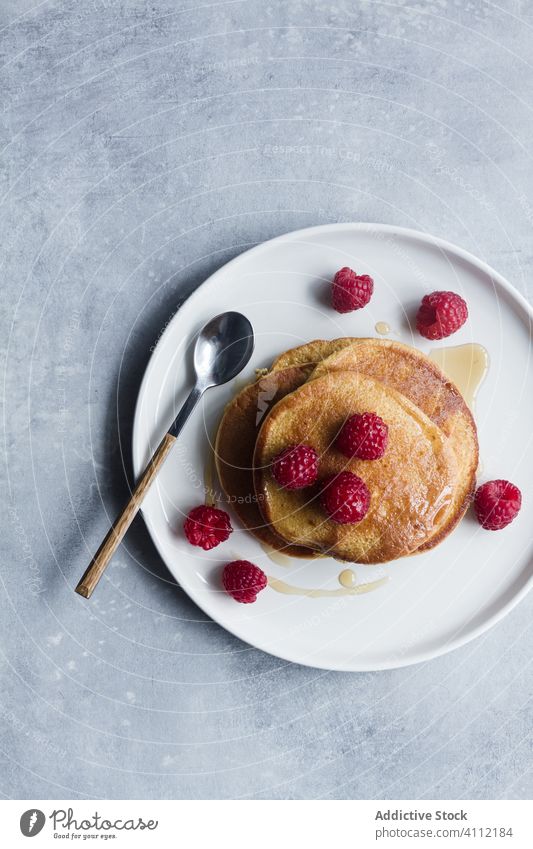 Delicious pancakes with fresh raspberries raspberry plate spoon dessert breakfast morning delicious sweet food tasty pastry gourmet ripe yummy homemade snack