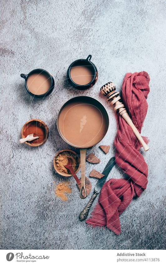 Hot mexican chocolate with spices on table hot drink tradition cinnamon pepper natural food cocoa fresh cup pot composition aroma tasty organic bowl homemade