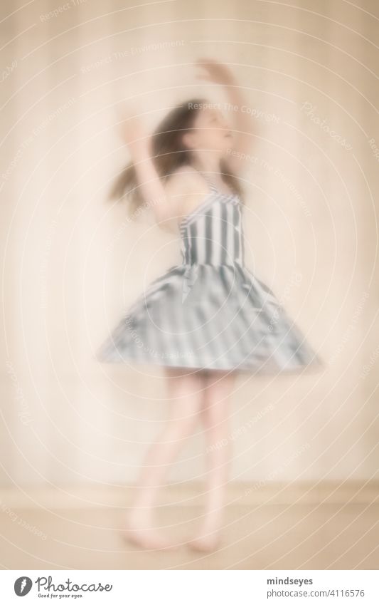 Little striped dancer intentionally blurry Dress Striped Dancer dancing girl Feminine Colour photo Human being Portrait photograph young Beautiful costume
