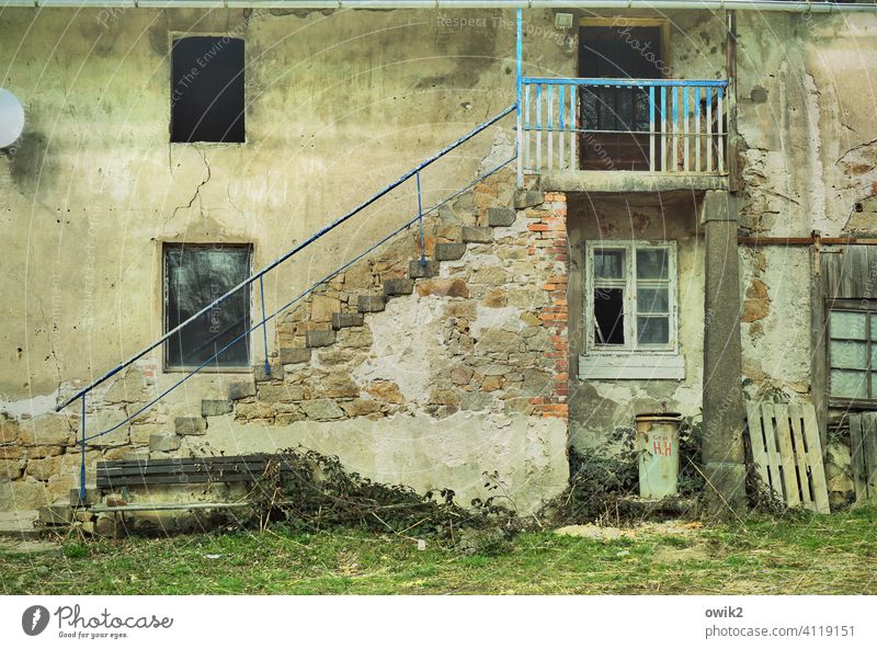 Redevelopment case Facade Wall (building) Wall (barrier) Building House (Residential Structure) door Stairs Banister Stone Trashy Caution Reckless Colour photo