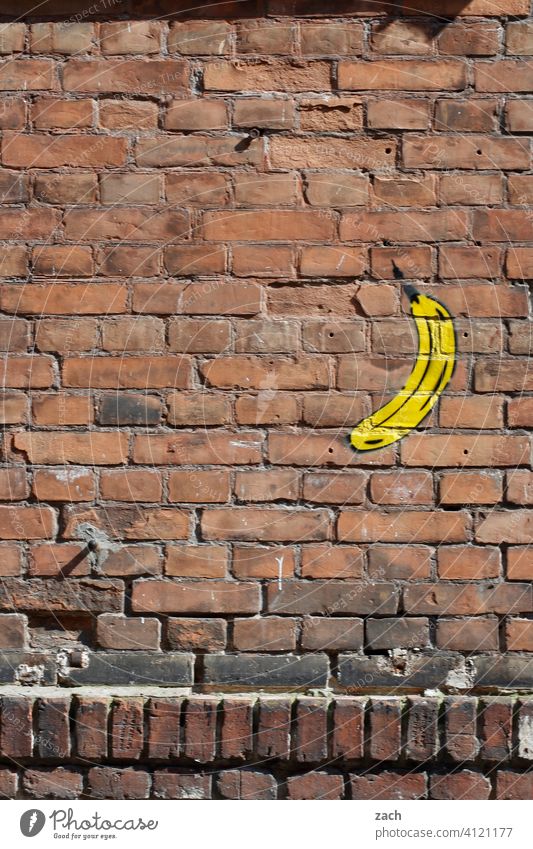bananas of all things Facade Wall (building) House wall Wall (barrier) Banana Fruit Graffiti brick bricks
