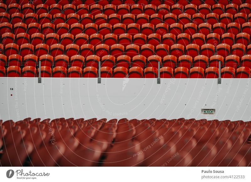 Empty seats in event Seating Cancelation Concert Audience Stadium Crowd of people Sit Row of chairs Row of seats Event Chair Seating capacity Places Free