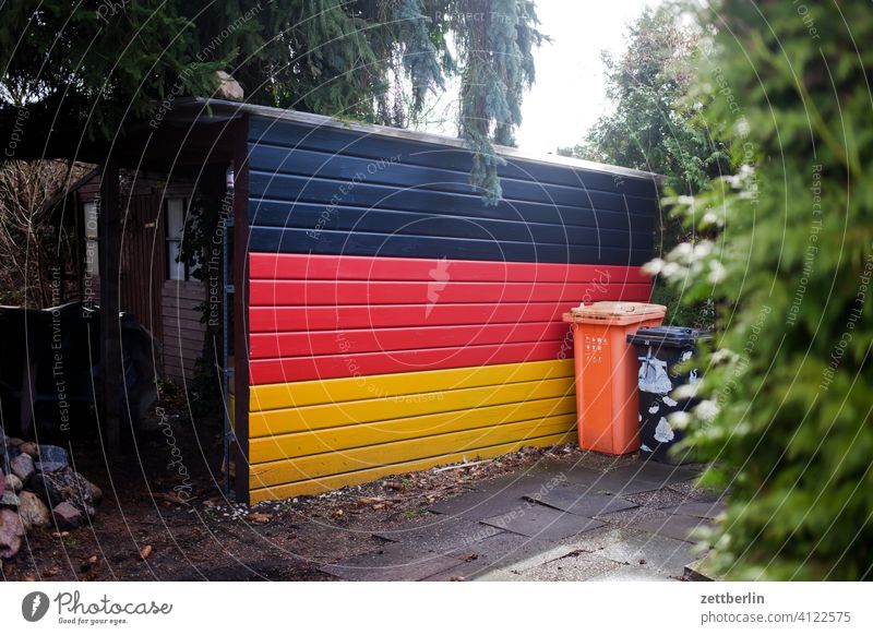 German national colours on the shed wall Germany German flag Flag Colour spring Spring Garage Garden Gold allotment Garden allotments Deserted nationalism