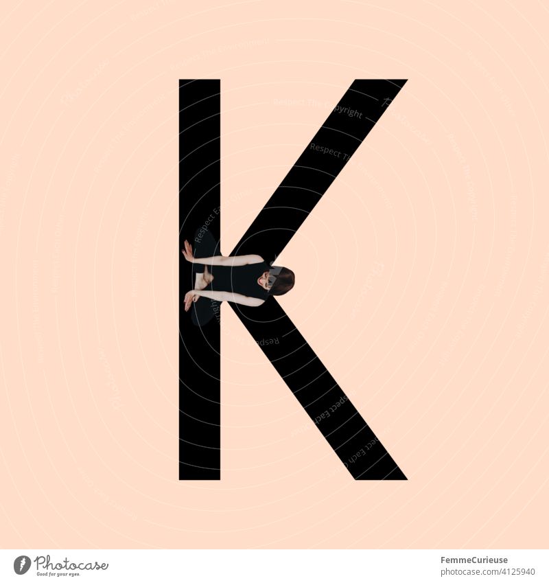 Graphic shows black letter K of the Latin alphabet against a skin-coloured background and integrated photographic full-body shot of a posing brunette woman with bob hairstyle in black one-piece suit