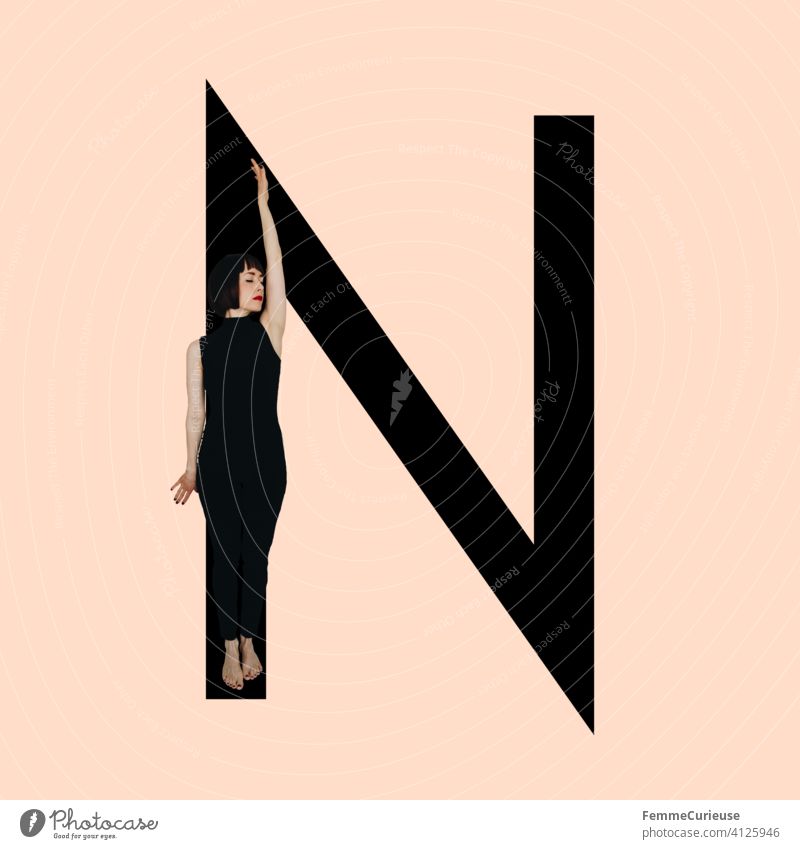 Graphic shows black letter N of the Latin alphabet against a skin-colored background and integrated photographic full-body shot of a posing brunette woman with bob hairstyle in black one-piece suit