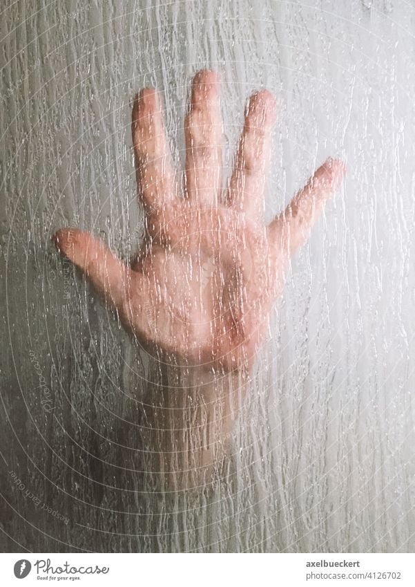 hand behind frosted glass window horror handprint crime mystery thriller male person murder pane bath screen shower screen finger palm violence sex halloween