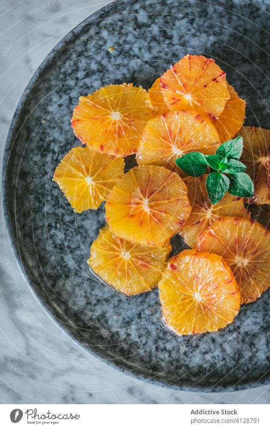 Delicious orange slices and peel on plate fresh citrus pulp dish kitchen fruit table dessert snack delicious vitamin natural organic healthy food ingredient
