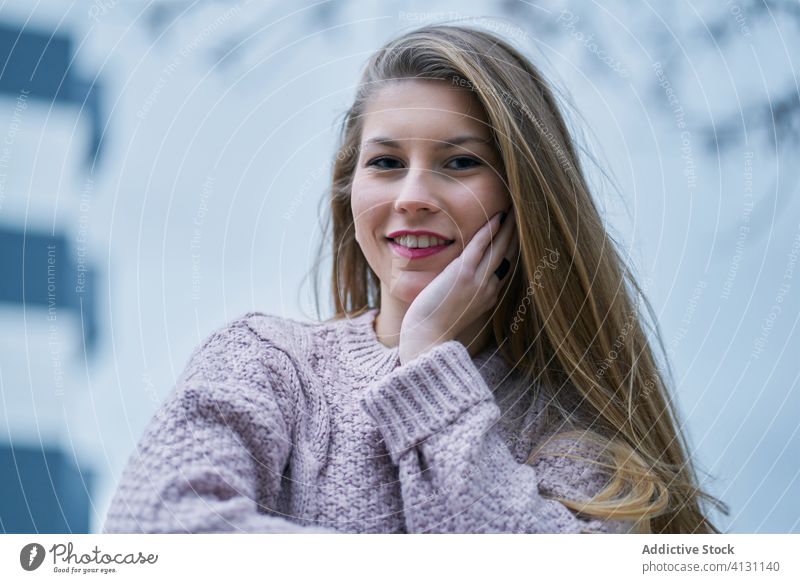 Positive young female student with flowing hair in park woman smile individuality kind positive mood personality portrait happy walk care dreamy human face