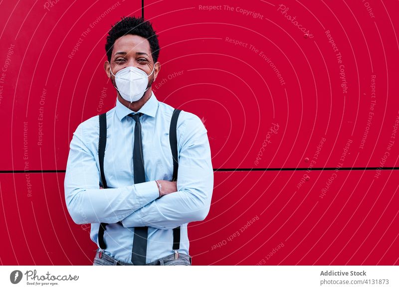 African American man wearing respirator on street protect mask elegant covid 19 coronavirus outbreak city pandemic urban black african american ethnic prevent
