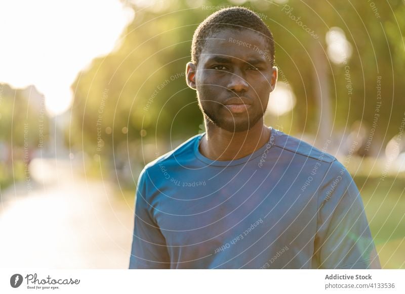 Portrait of black man in park portrait person adult male people background face young looking at camera african blurred background outdoor outdoors lifestyle