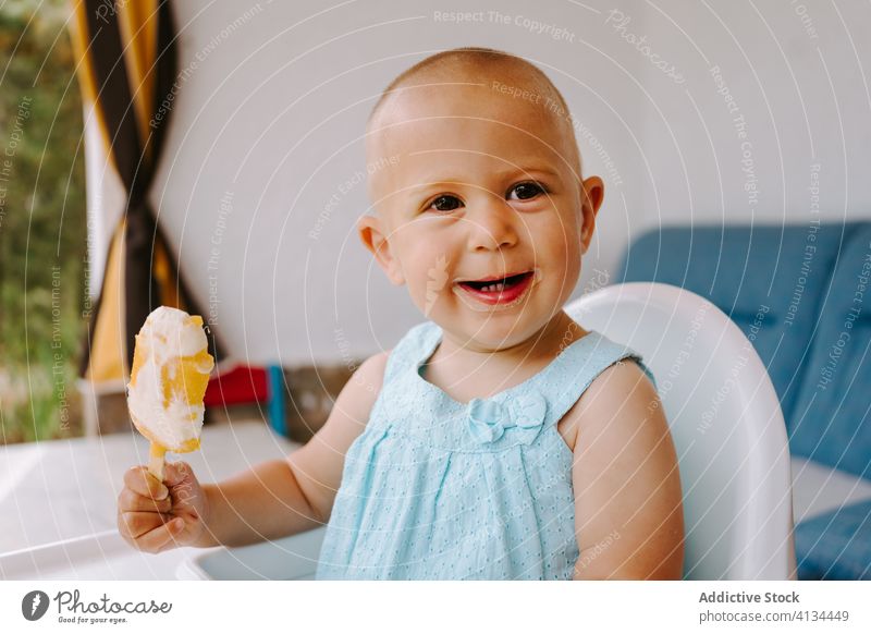 Adorable girl with mold of homemade ice lollies eat popsicle toddler ice cream summer adorable delicious treat terrace kid little child childhood relax female