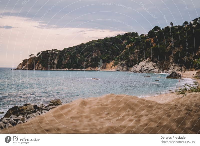Image of a mediterranean cove on a Spanish beach Rock peaceful scenery stone holiday bay horizon serene location travel summer spain tranquil explore wonderful