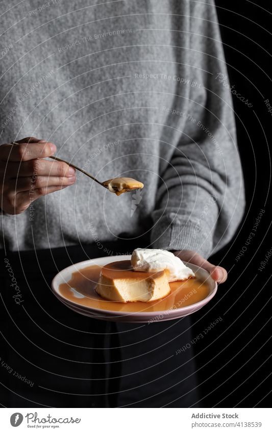 Crop woman with traditional Flan flan caramel custard pudding cream delicious tasty eat female food yummy dessert plate sweet snack meal treat delectable dish