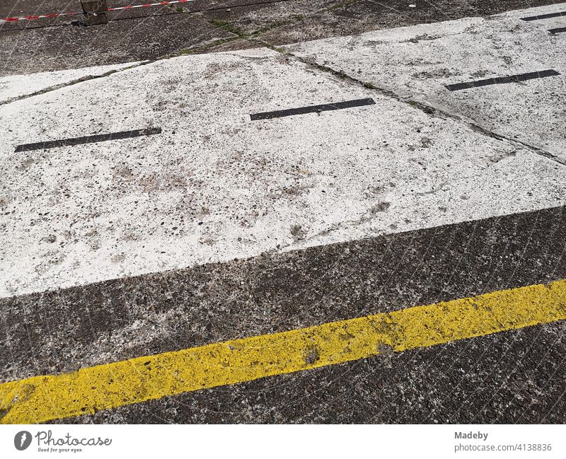Painted runway with yellow line for children at the airfield festival at the glider airfield in Oerlinghausen near Bielefeld in the Teutoburg Forest in East Westphalia-Lippe