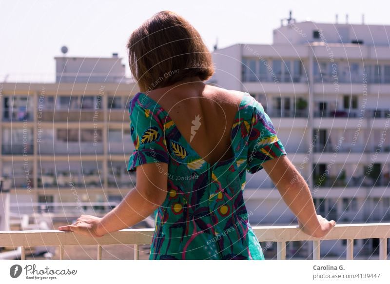 Woman on a balcony in a sunny morning Young woman Balcony Sunlight indoors Quarantine confinement isolation Isolated female quarantine coronavirus pandemic