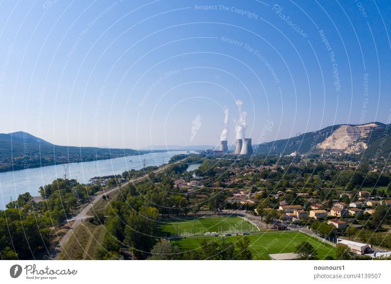 Nuclear power plant in the Rhone Valley generates electricity Radiation Sky Industry Electricity Nuclear Power Plant cooling tower Smoke