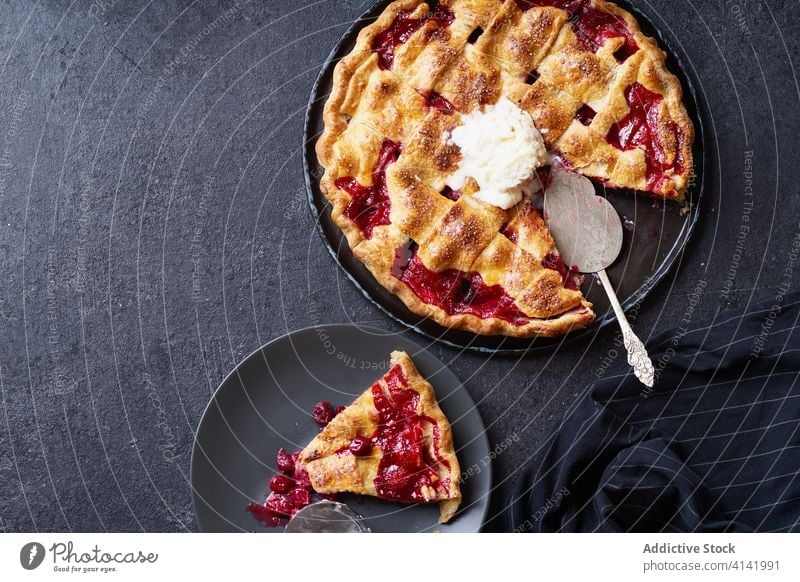 Top view image of cherry pie decorated with lattice thanksgiving food variety season autumn baking dinner seasonal round traditional closeup fresh cuisine table