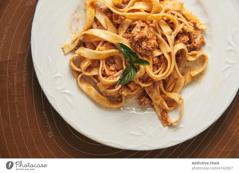 Delicious Bolognese pasta served on plate bolognese sauce food delicious eat cuisine meal basil culinary recipe kitchen natural homemade tasty cook dinner yummy