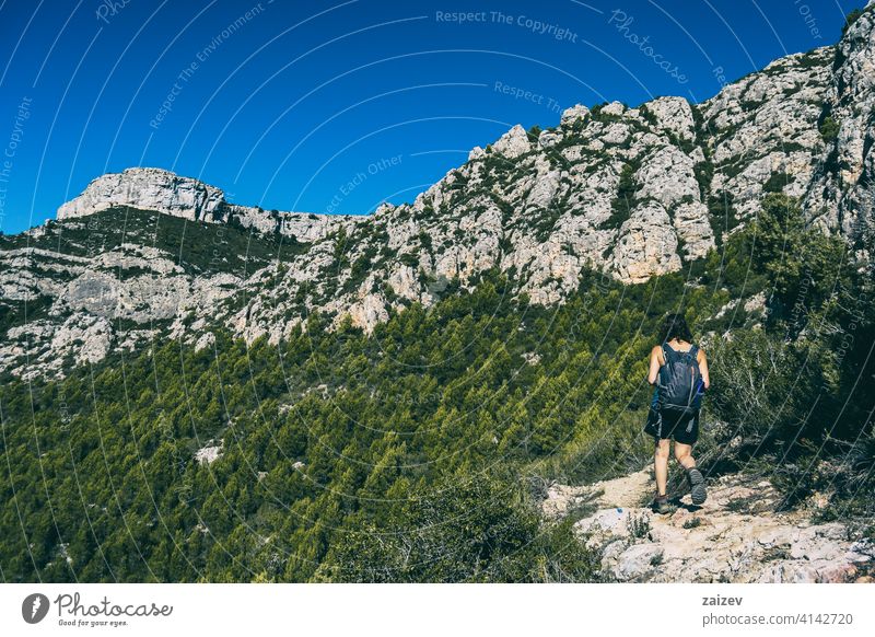 woman hiking on a mountain path in catalonia spain outdoor copy space color people female one person freedom travel healthy happiness success raised park