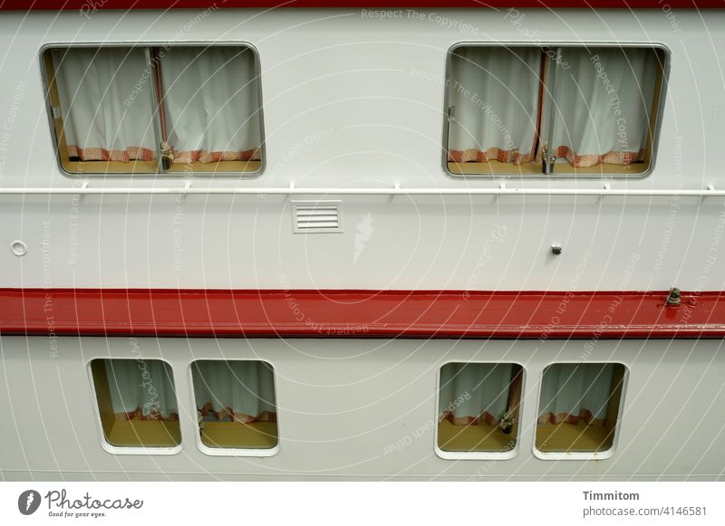 The river cruise ship also takes a break Navigation Break standstill Window drapes Closed Nothing works Exterior shot Deserted Passenger ship