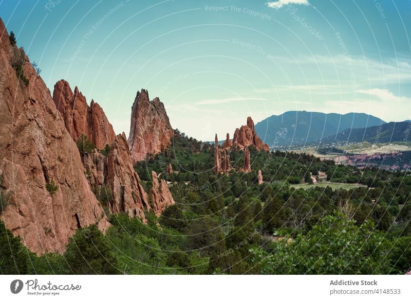 Scenery of rocks and forest on sunny day garden of the gods famous landmark valley breathtaking environment nature destination landscape colorado usa