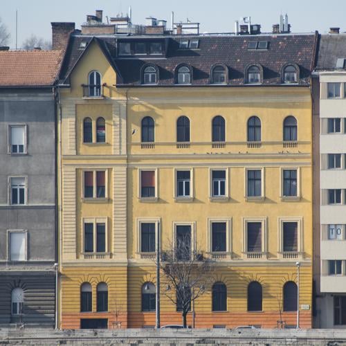 Budapest town house Facade Architecture Town house (City: Block of flats) Bank reinforcement Authentic Orange Style Sunlight Colour scheme Structures and shapes