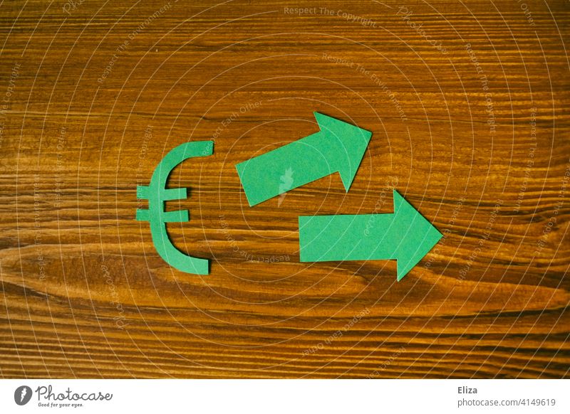 Green euro sign with two green arrows. Finances. Euro Money Euro symbol Investment Arrow Upswing yield profit finance Financial Industry cash flow financing