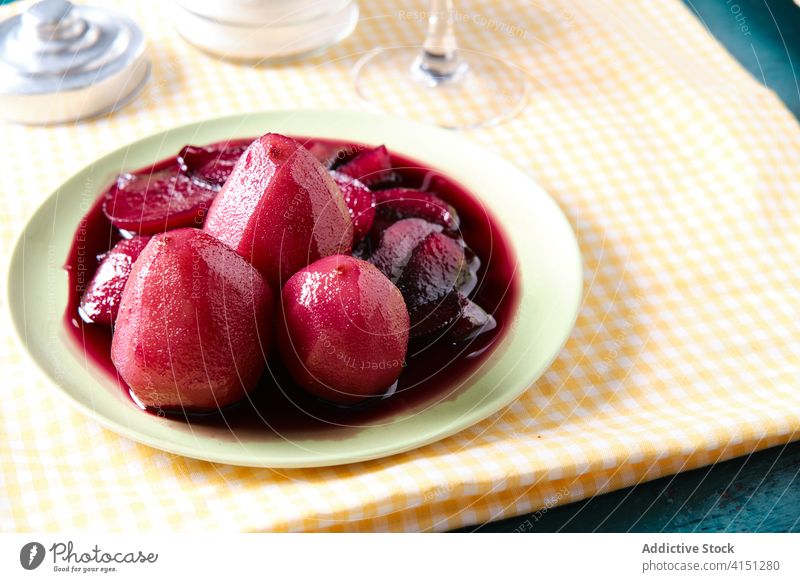 Delicious ripe pears in plate red wine poached tasty fruit delicious table fresh meal cafe restaurant yummy food gourmet portion dish alcohol nutrition serve