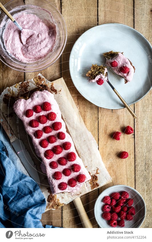 Delicious homemade cake with raspberries raspberry cream dessert food sweet pastry unrecognizable yummy delectable baked kitchen cook tasty recipe cuisine meal