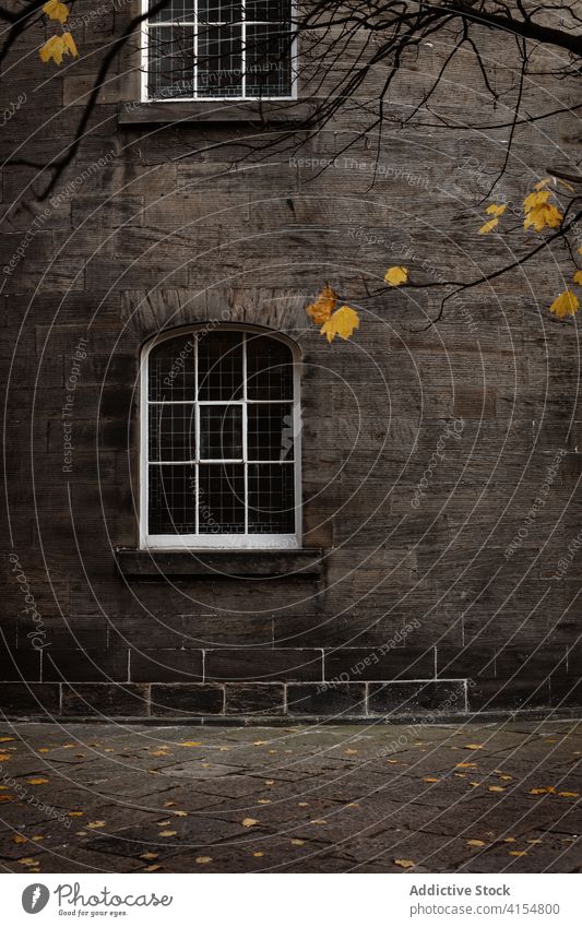 Part of stone building in city residential street autumn gloomy facade architecture shabby scottish highlands scotland united kingdom uk exterior detail