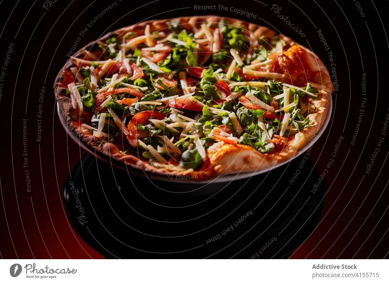 Delicious pizza on plate spin fresh dish italian tradition dark food cuisine yummy snack meal delicious tasty gourmet baked appetizing restaurant scrumptious