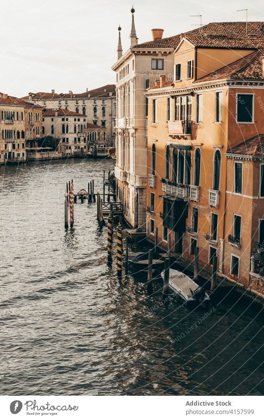 Water canal in city with residential buildings water cityscape architecture morning facade old venice italy weathered town historic tourism urban attract