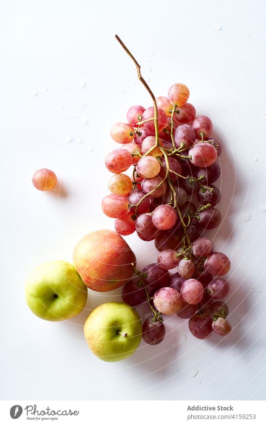Pink muscatel grapes fruit bunch berry white food pink red vine fresh grapevine healthy winery ripe nature juice leaf cardinal summer apple flocked green