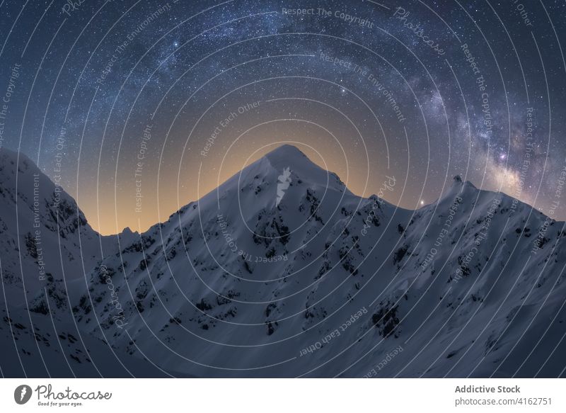 Snowy Pyrenees under bright starry sky in evening pyrenees nature snow highland milky way atmosphere astronomy winter twilight rough ridge scenic landscape