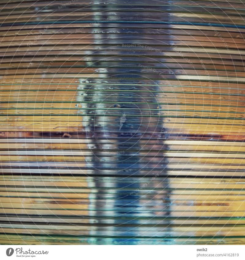 Air column cd slices Stack stacked Many center Heap Plastic Translucent Mysterious Detail Structures and shapes Abstract Colour photo puzzling Arrangement Equal