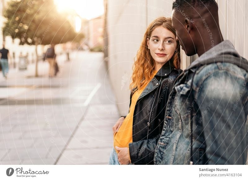 Lovely Multiethnic Couple copyspace looking at each other front view portrait relationship multi-racial black man caucasian multi-cultural multi-ethnic together