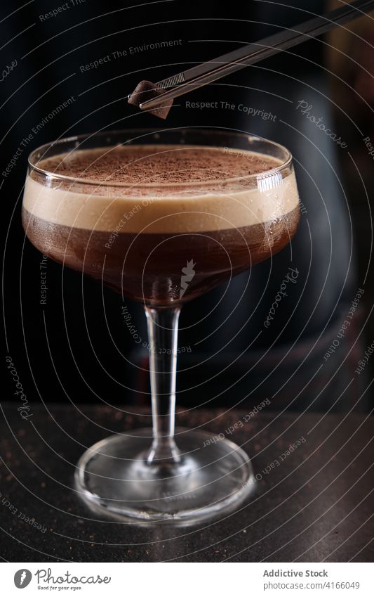 Crop bartender with chocolate Martini in bar martini cocktail alcohol glass coffee barkeeper aroma male pub counter beverage drink tasty fresh refreshment