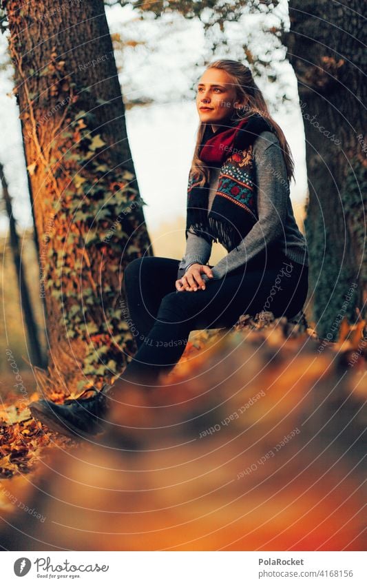 #A9# Autumn sitting Exterior shot Autumnal weather Autumn leaves Hiking Positive To go for a walk Hair and hairstyles being out Experience Nature Young woman